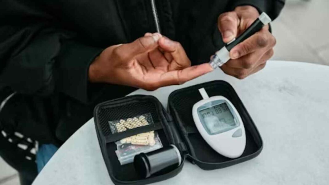 Person testing blood glucose with a glucometer and finger prick device.