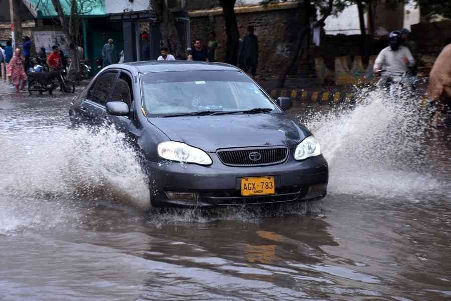 Karachi Rain Alert: Meteorological Department Issues Key Update Karachi rain on city streets with cloudy sky