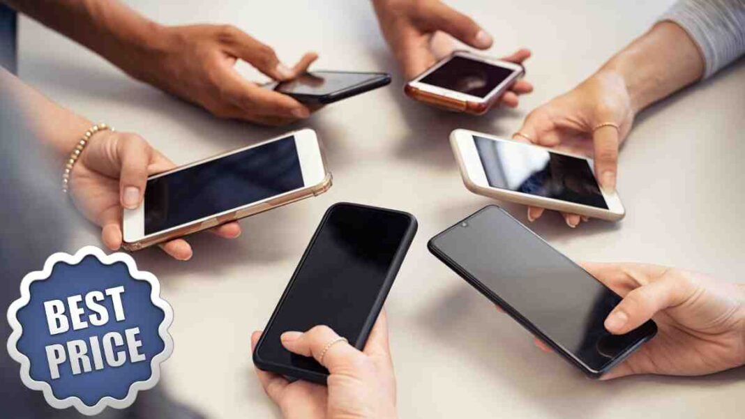 People comparing smartphones for the best mobile under 50000 in Pakistan