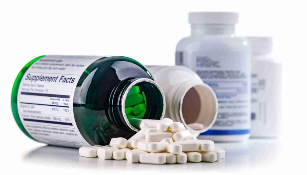 Herbal supplements capsules with supplement facts label showing FDA regulation concept