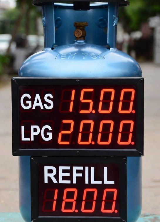 LPG gas cylinder with price display showing high rates