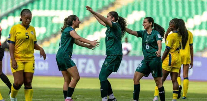 Pakistan women football team players celebrating goal during international match