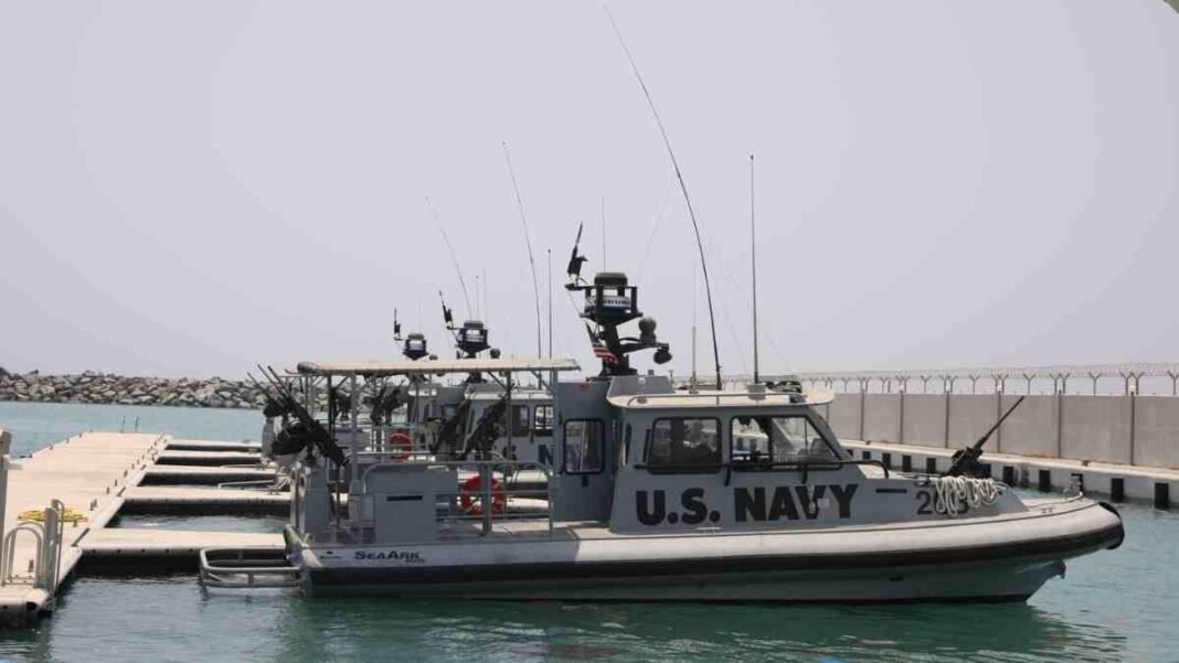 us navy patrol boat monitoring strait of hormuz waters