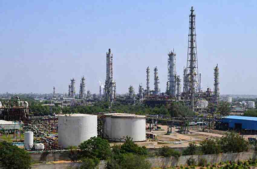 Large oil refinery plant with storage tanks and pipelines