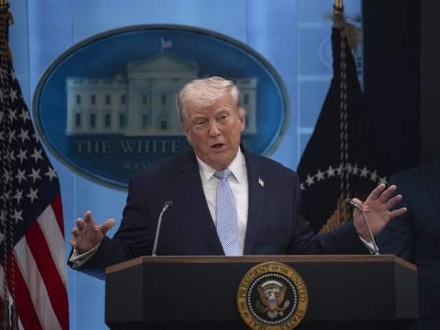 Donald Trump speaking about possible US action against Iran during a press briefing