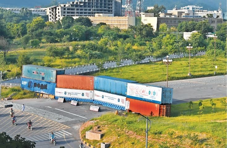 Containers blocking road in Islamabad for high-level meeting security