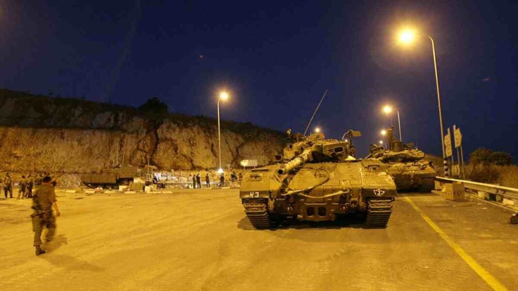 israeli tanks and soldiers near lebanon border at night