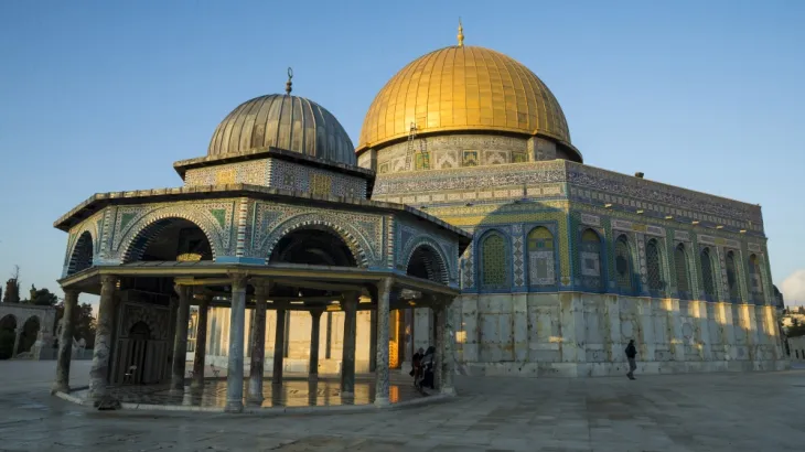 Al-Aqsa Mosque in Jerusalem with its iconic golden dome and historic courtyard
