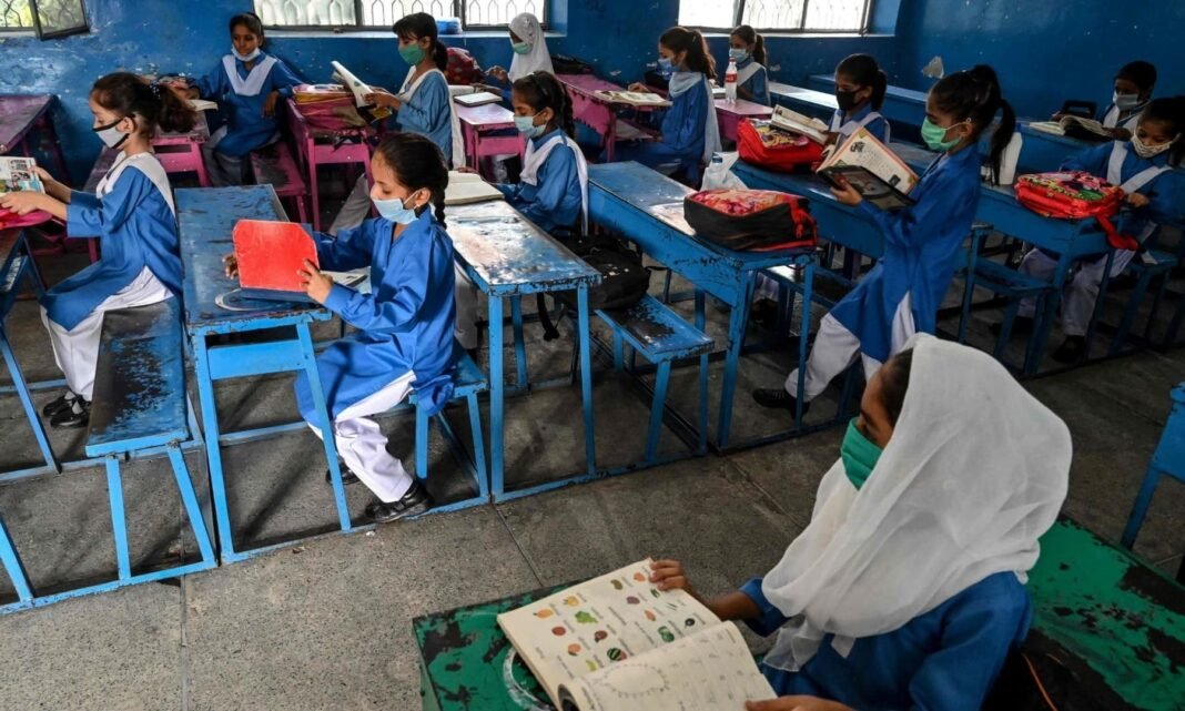 Primary school students in Pakistan classroom learning