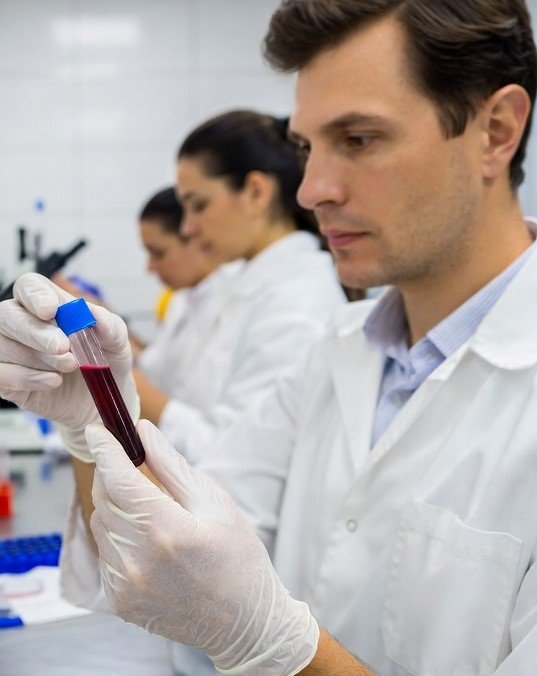 Scientists at University of California, Davis developing a new TB blood test in a laboratory