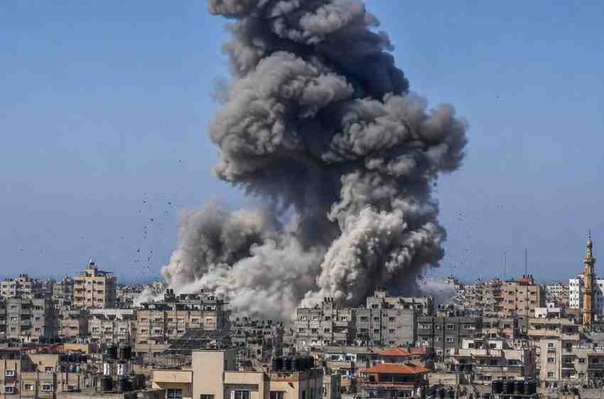 Smoke rises over Gaza after an Israeli airstrike targeting a residential area
