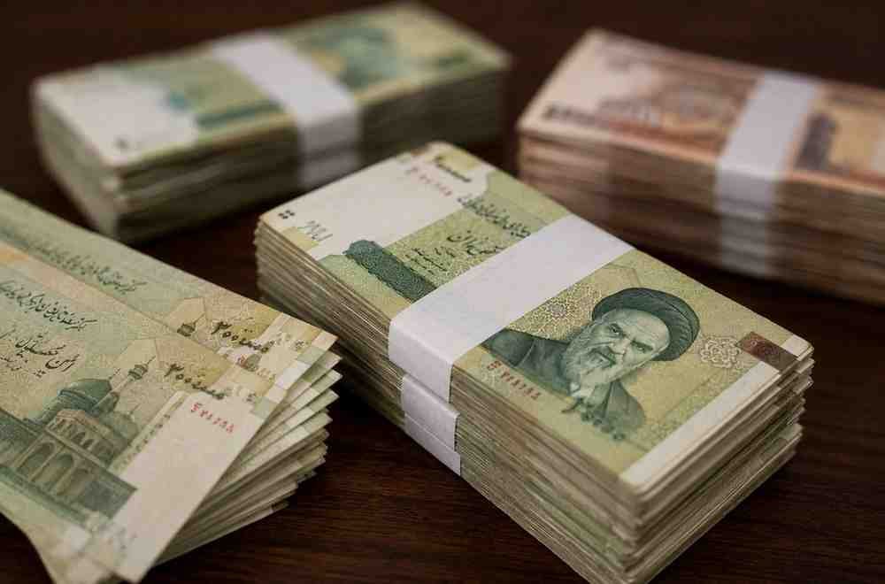 Bundles of Iranian Rial currency displayed in Pakistan open marke