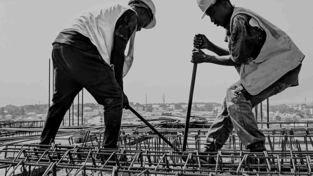 Construction workers in Pakistan working on a building site on Labour Day
