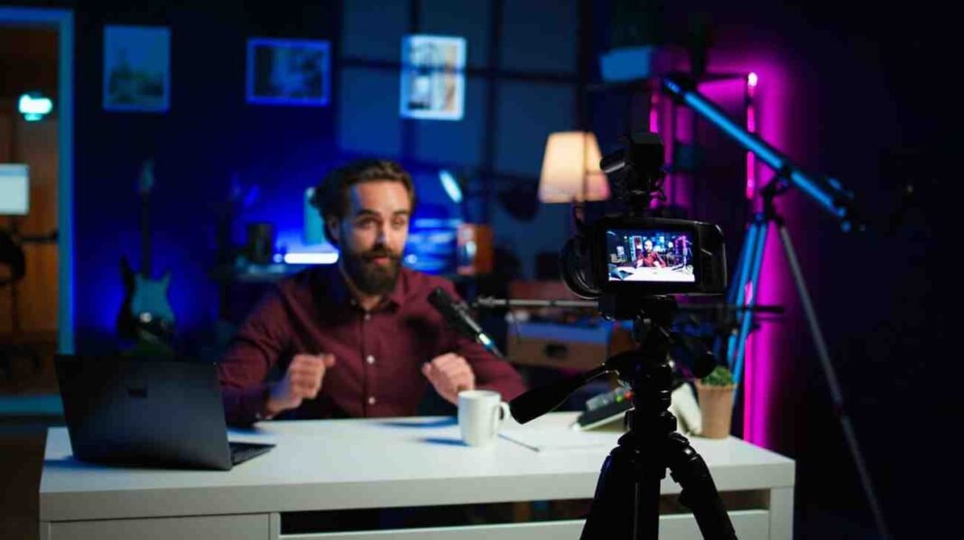Content creator recording a video in a modern studio setup.