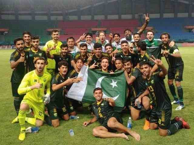 Pakistan national football team celebrates after winning an international tournament.