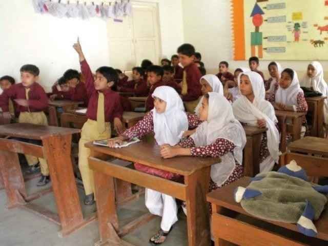 Students attending a class in a government school in Khyber Pakhtunkhwa.