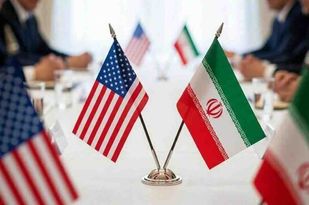 latestnew US and Iran flags displayed during peace agreement talks facilitated by Pakistan.