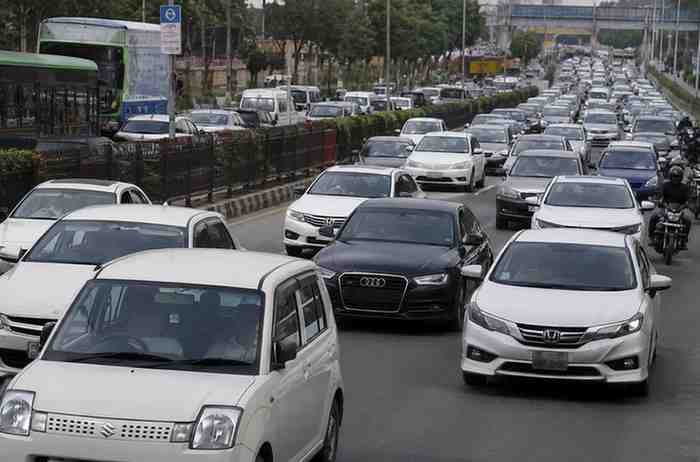vhiecletokenta Punjab traffic on a busy city road as the government increases vehicle token tax rates.
