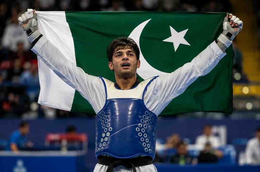 Pakistani taekwondo athlete celebrates after winning an international gold medal.