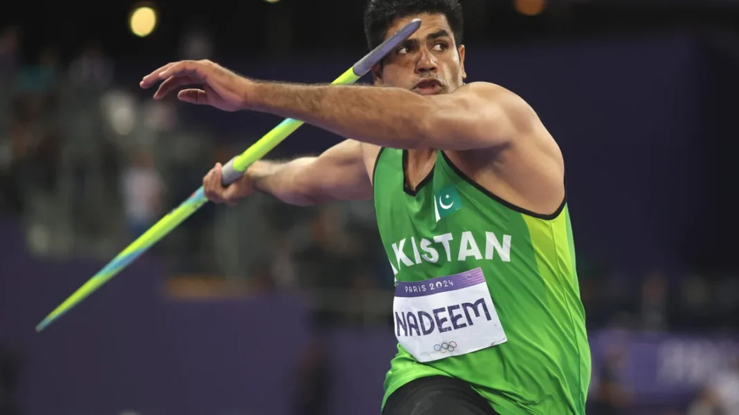 Pakistan Sports: Cricket, Hockey, Squash & Olympics Overview Arshad Nadeem throwing javelin at Paris 2024 Olympics