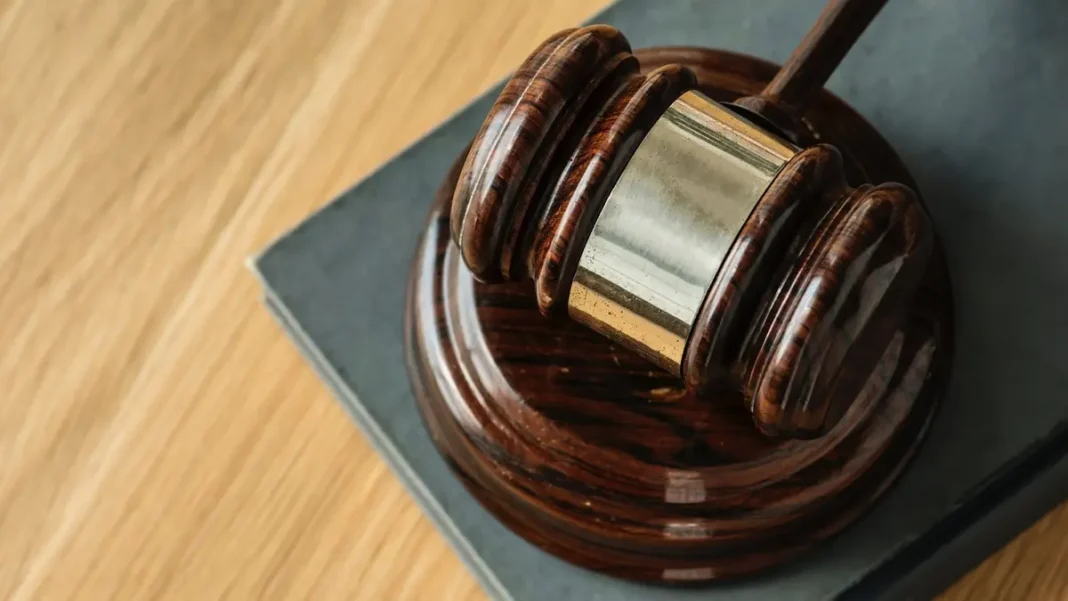 Article 13 of the Constitution of Pakistan: The Double Punishment Bar Gavel on a courtroom desk symbolising justice and protection against double punishment