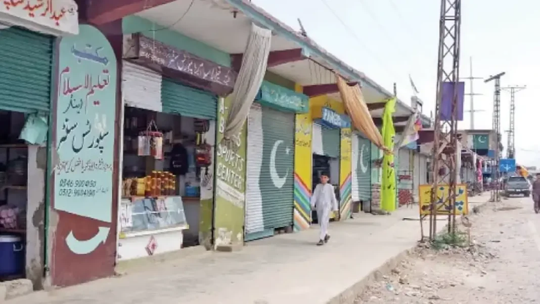 PTI Bara Protest Turns Violent as Police Fire Tear Gas, Live Rounds PTI Bara protest: shuttered shops line a street in the Khyber district