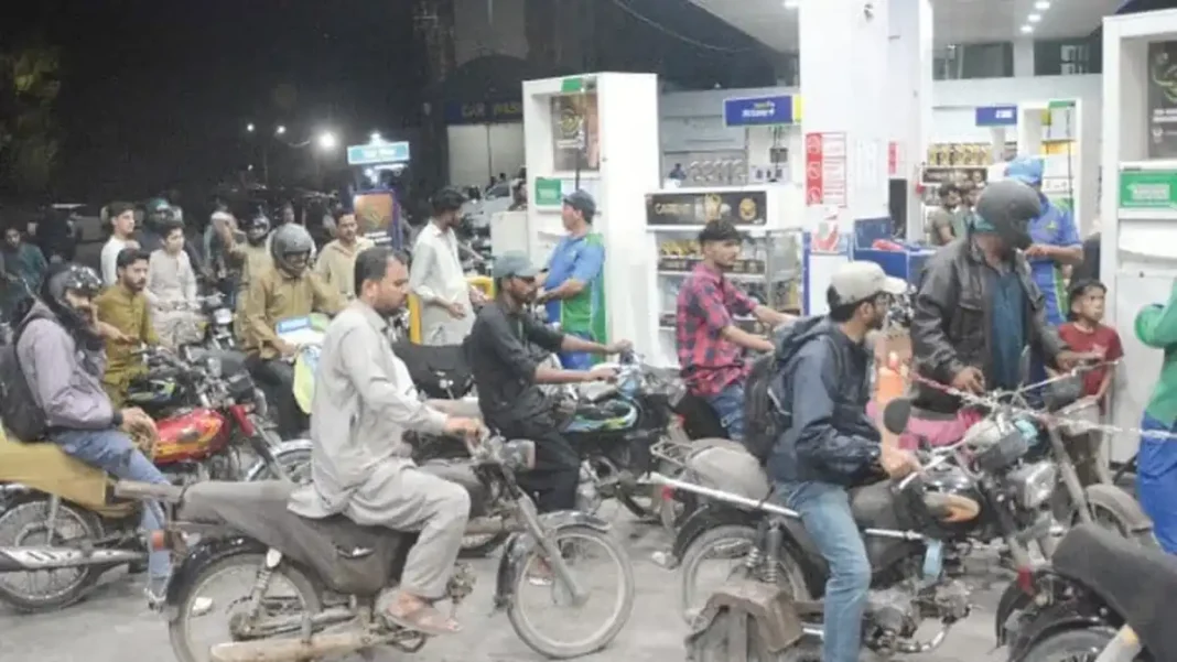 Petrol Rises to Rs379.25, Diesel to Rs395.82 Motorcyclists queue at a petrol pump in Karachi as petrol diesel prices October 27 rise