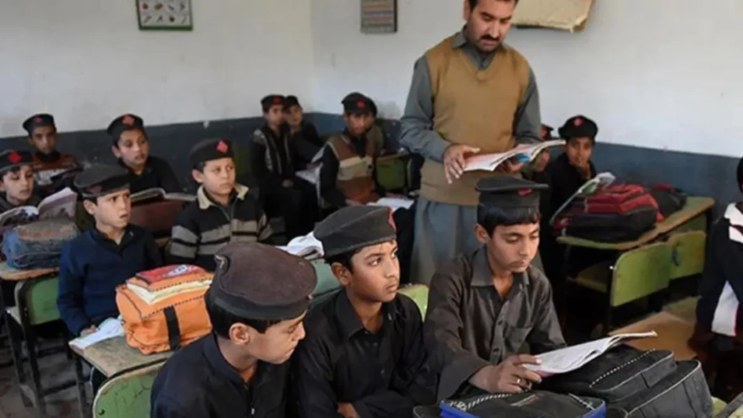 Schools and Colleges Closed in Three KP Districts on Monday After Emergency Imposed Schools closed in three KP districts: pupils sit in a classroom in Khyber Pakhtunkhwa while their teacher stands nearby