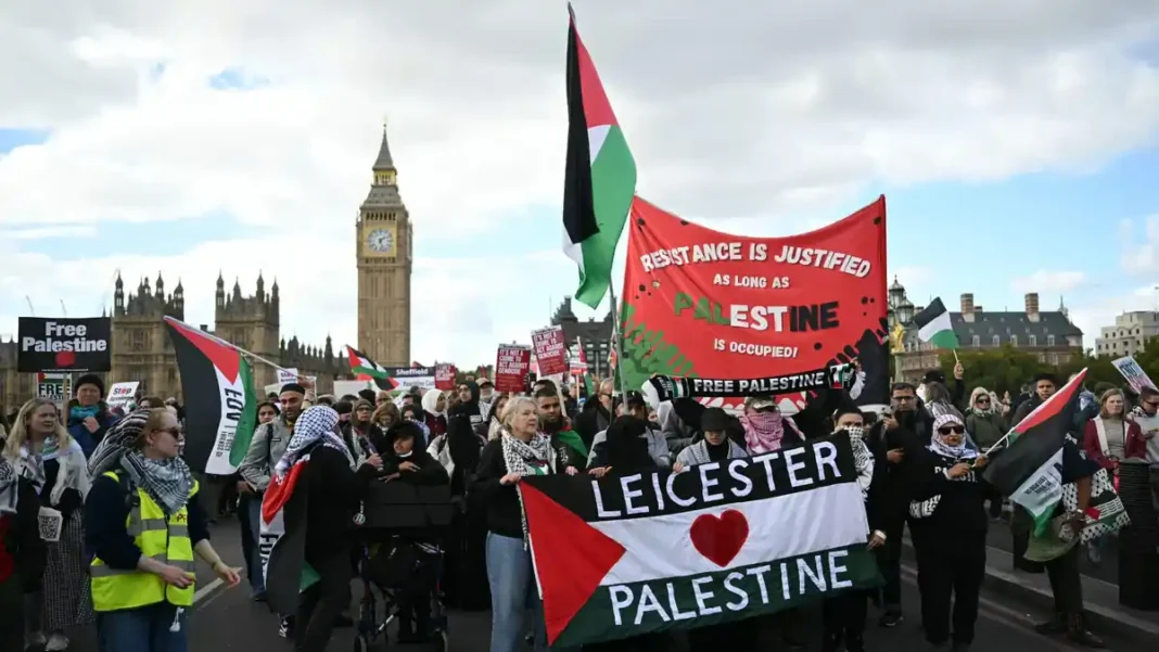 Pro-Palestinian marches in London cross Westminster Bridge pro-palestinian marches crossing Westminster Bridge in London with Palestinian flags and placards