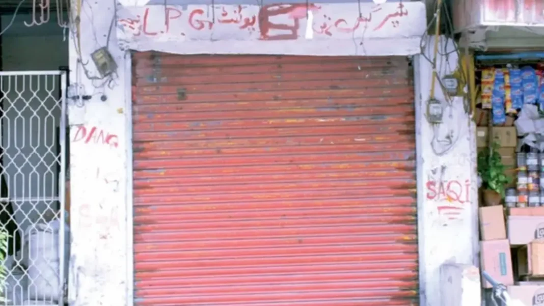 LPG Dealers Shut Shops as Consumers Hunt for Gas A shuttered shop of LPG dealers with its red shutter down, as dealers shut shops in protest