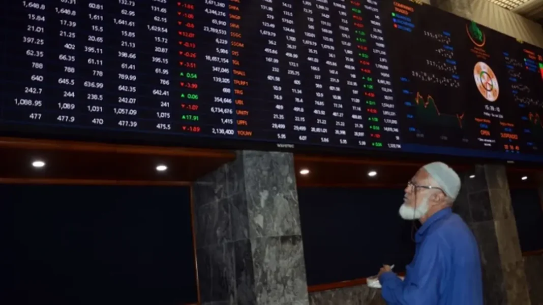 KSE-100 Falls 4,045 Points in Fifth Weekly Drop A man watches the KSE-100 share board at the Pakistan Stock Exchange