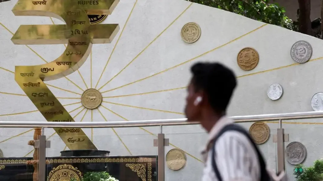 RBI dollar curbs: rupee symbol installation in Mumbai as India moves to defend its currency