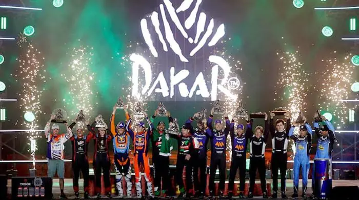 Dakar Rally to Return to Africa in 2027 Amid Saudi Security Fears, Sources Say Dakar Rally winners celebrating on the podium ahead of Dakar Rally 2027 in Morocco