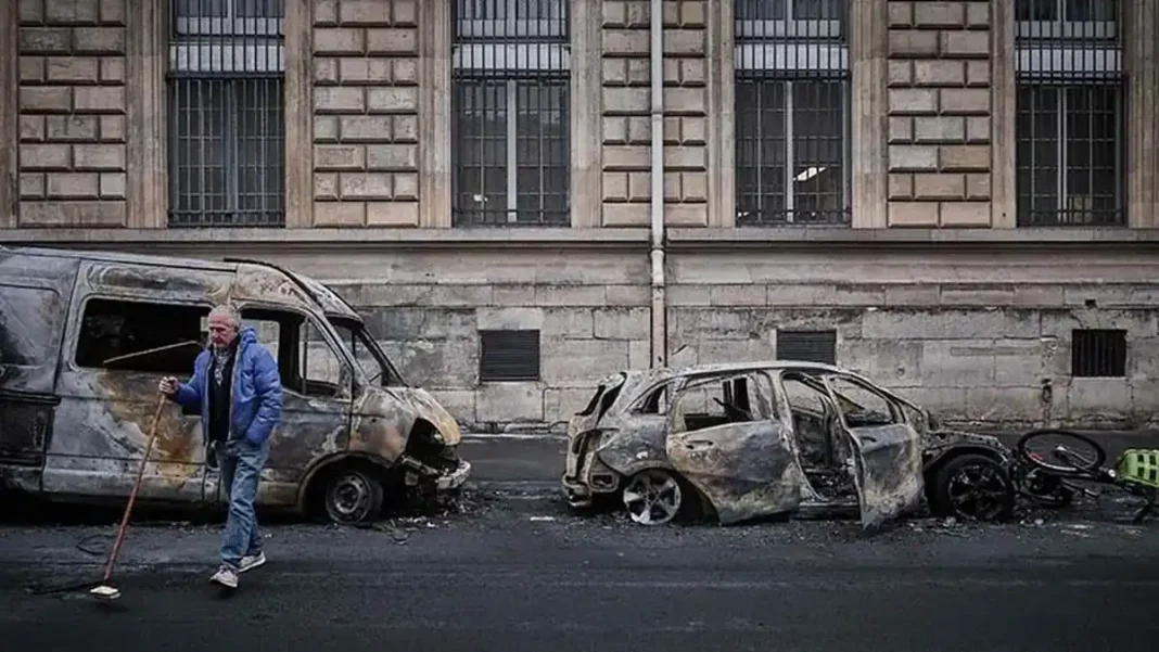 France imposes curfews in Paris, Lyon and Lille as protest violence escalates Burnt-out cars in France after cost-of-living protests that led to France curfews in Paris and other cities