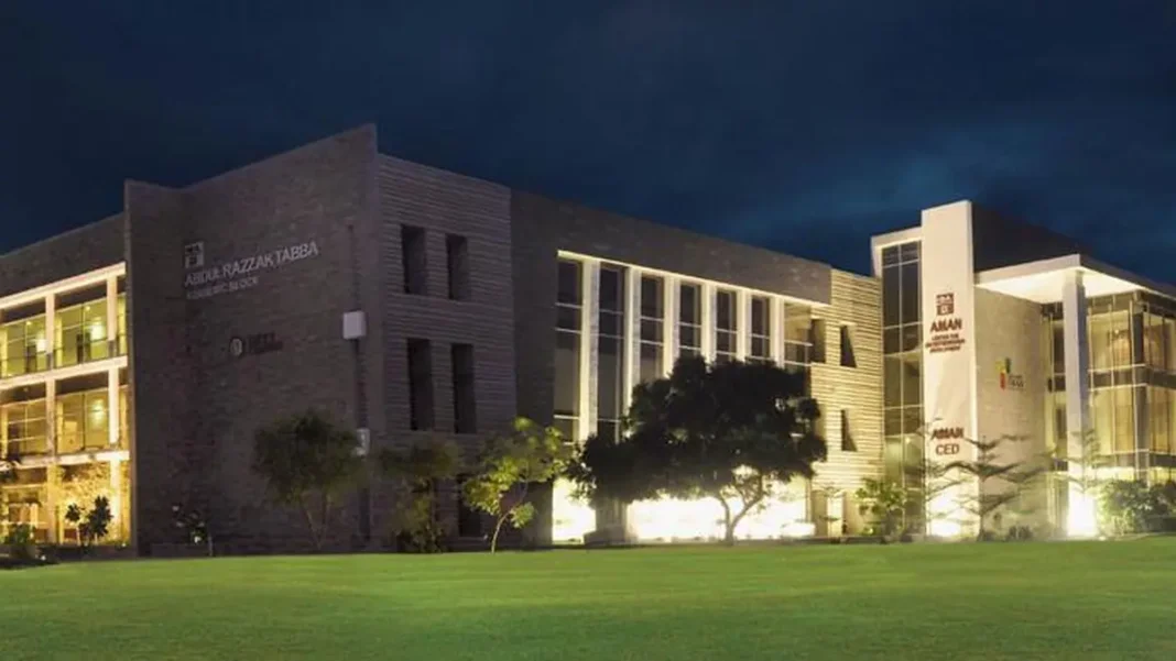 Pakistan Regulatory Reform Must Shift, Experts Say IBA Karachi campus at night — Pakistan regulatory reform