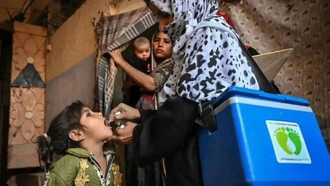 Karachi Polio Case Takes Pakistan’s 2026 Tally to Seven A health worker administering oral polio drops to a child during a vaccination drive, as a Karachi polio case takes Pakistan's 2026 tally to seven