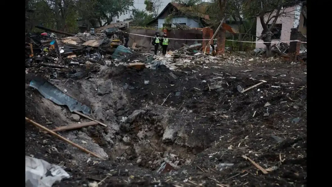 Russia, Ukraine trade fresh attacks hours after Witkoff-Putin talks Ukrainian police officers inspect a crater after Russia-Ukraine attacks hit Kyiv
