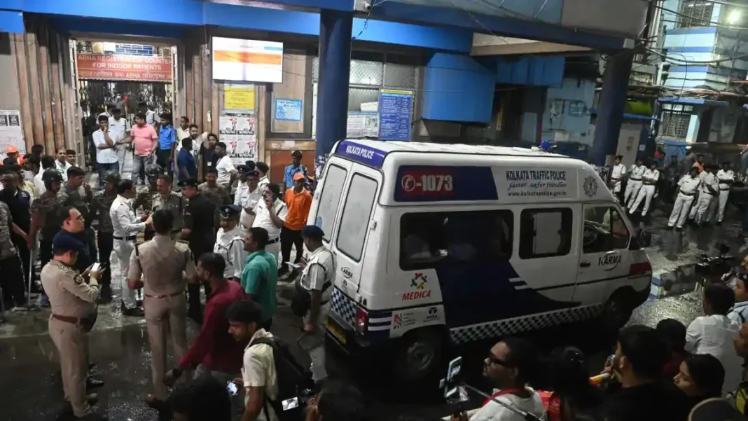 Kolkata Durga Puja Stampede Kills 17, Injures 25 Kolkata Durga Puja stampede — police and ambulance at the scene of the night-time crush in Kolkata