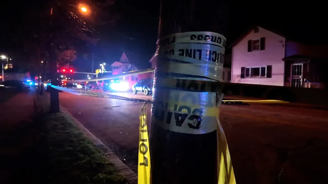 Erie Pennsylvania Shooting: Police Say 45-Year-Old Gunman Killed 8, Including Pregnant Woman and Two Children Police tape and flashing patrol cars at the Erie Pennsylvania shooting crime scene on Perry Street