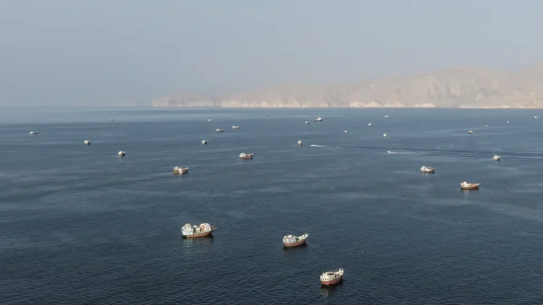 Hormuz Tanker Fires Deepen Strait Crisis Small vessels in the Strait of Hormuz - Hormuz tanker fires