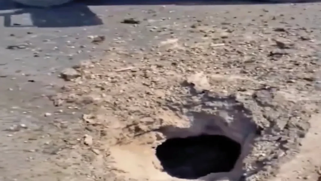 Riyadh Missile Attack: Two Missiles Intercepted A crater in the ground after a strike - Riyadh missile attack