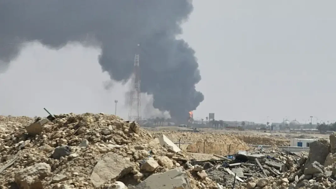 Saudi Coalition Intercepts Houthi Ballistic Missile Aimed at Riyadh Houthi missile — smoke rises from a fire after a Houthi strike in Saudi Arabia