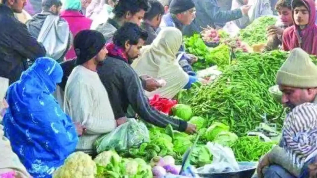 Faisalabad Food Prices Soar Past Official Rates Shoppers at a vegetable market - Faisalabad food prices