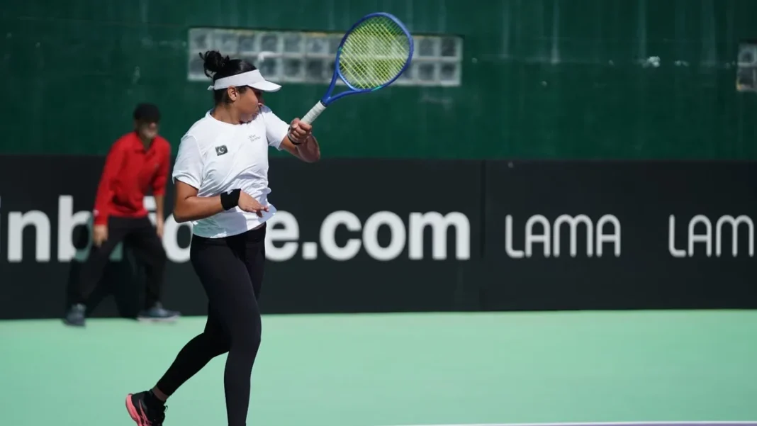 Pakistan rout Bhutan 3-0 to extend winning run at Billie Jean King Cup Billie Jean King Cup: Pakistani player returns a shot at the PTF Tennis Complex