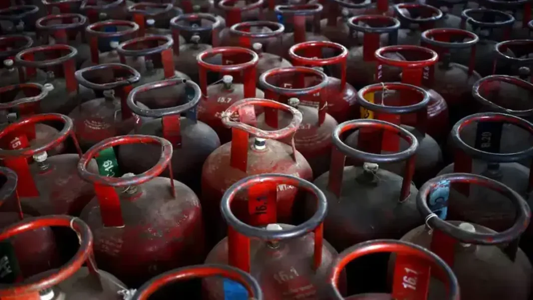 LPG Price Hike in Pakistan Blamed on Border Closure Red LPG cylinders stacked together, LPG price hike