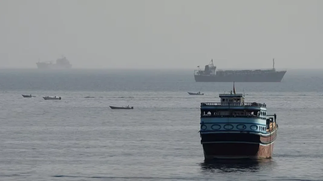 Third Tanker in Two Days Strikes Mine in Strait of Hormuz, IRGC Navy Says tanker strikes mine in Strait of Hormuz: tankers and boats in the strait, seen from Musandam, Oman, in a file photo