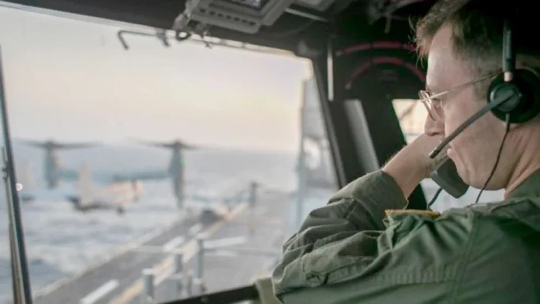 US Jet Disables Panama-Flagged Cargo Ship Over Iran Blockade in Gulf of Oman US naval officer on the USS Tripoli overseeing flight operations; US disables vessel Iran blockade in Gulf of Oman