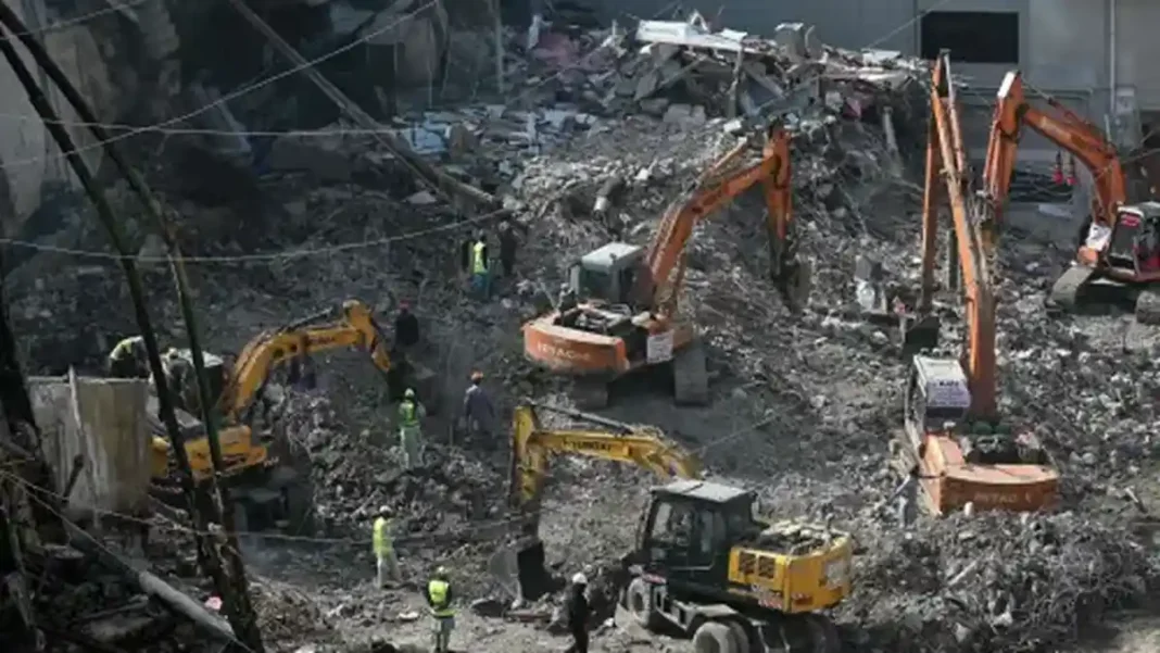 Court Accepts Gul Plaza Charge Sheet, Rejects Plea Excavators clearing rubble — Gul Plaza charge sheet