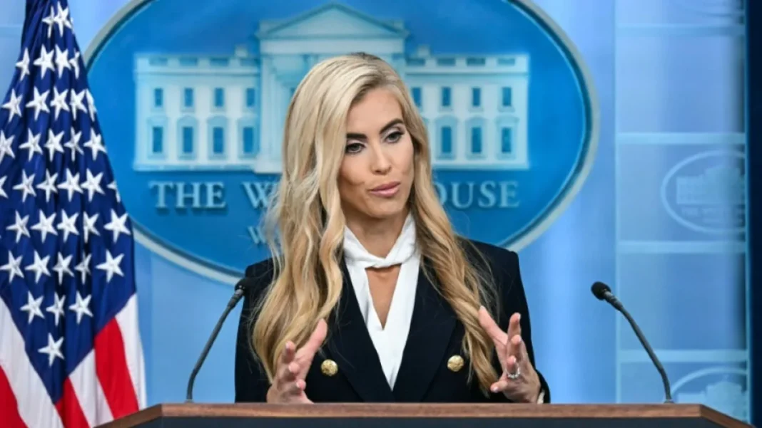 Trump’s New Press Secretary Faces Scrutiny Over Lawyer Claims White House press secretary Katie Zacharia at the briefing podium as her credentials face scrutiny