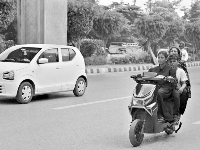 Women Take to Two Wheels in Islamabad and Rawalpindi for Independence Women riders Islamabad commuting on a scooter in the capital
